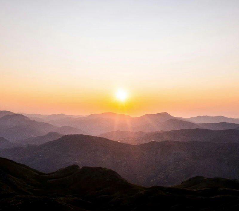 Sunrise over a mountain chain.